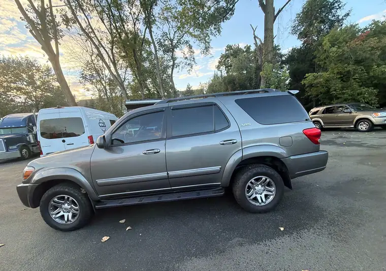 Gray 2005 Toyota Sequoia SUV in a parking lot at pickup in Clifton, New Jersey