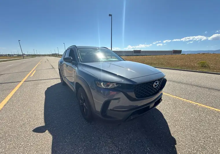 The same CX-50 on an empty road in Loveland, Colorado at delivery
