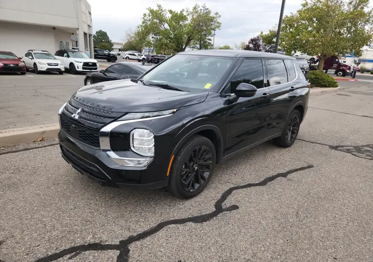 Black 2024 Mitsubishi Outlander SUV at pickup at a dealer in Albuquerque, New Mexico