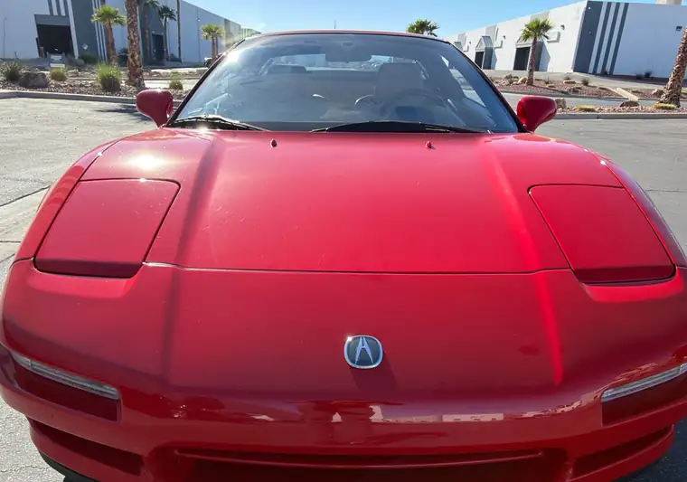 Red 1995 Acura NSX in a parking lot at pickup in Las Vegas, Nevada