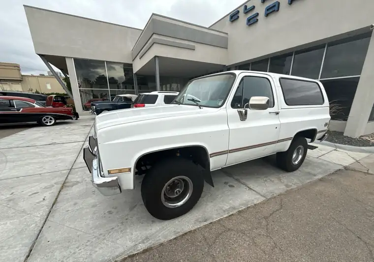 The same Blazer outside a classic-car dealership at delivery in Greeley, Colorado