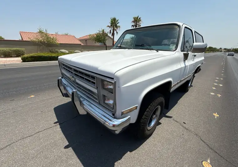 White 1987 Chevrolet Blazer on a street at pickup in Las Vegas, Nevada
