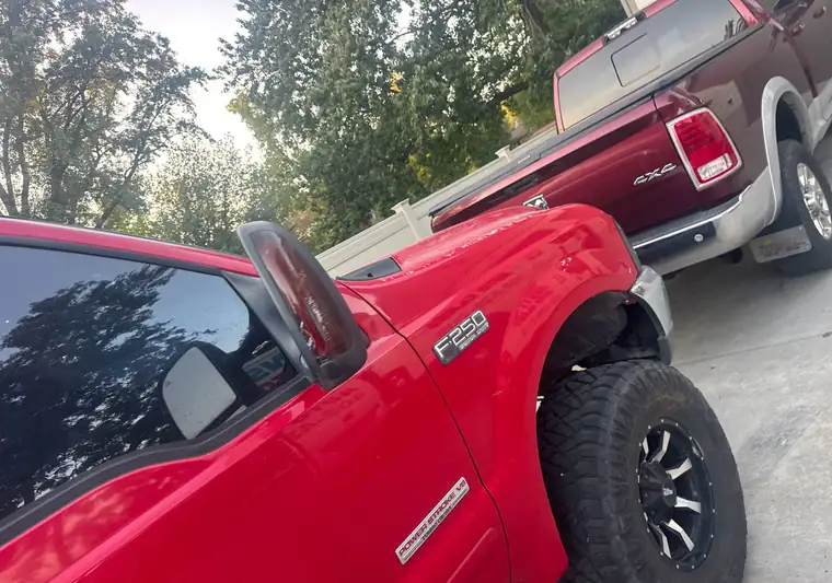 The same F-250 in a driveway at delivery in Lincoln, Nevada