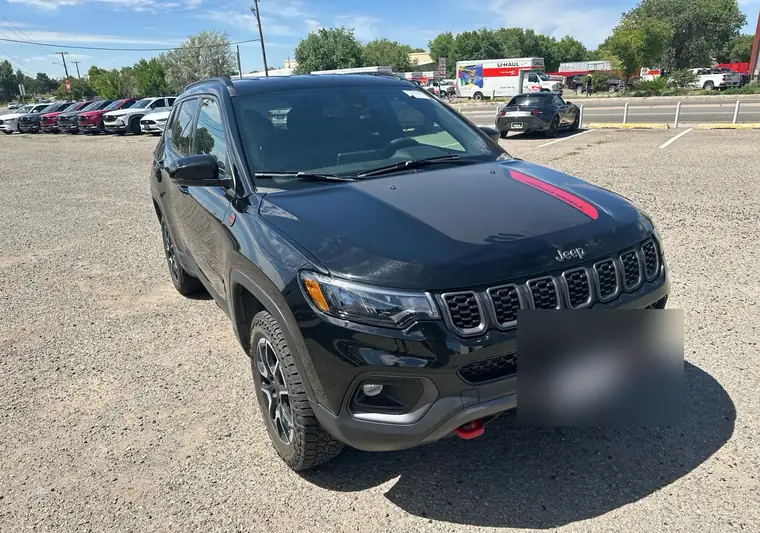 The same Compass in a lot at delivery in Santa Fe, New Mexico