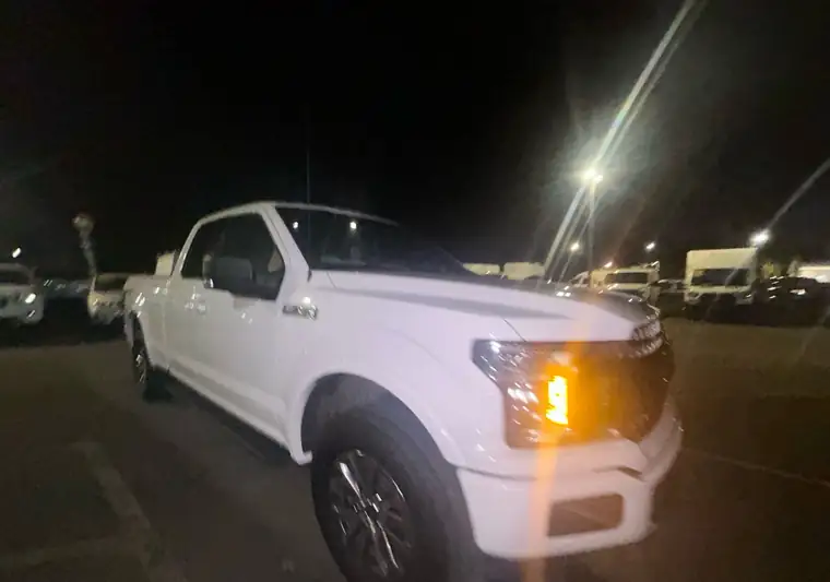 The same F-150 at night at delivery in Rowley, Massachusetts