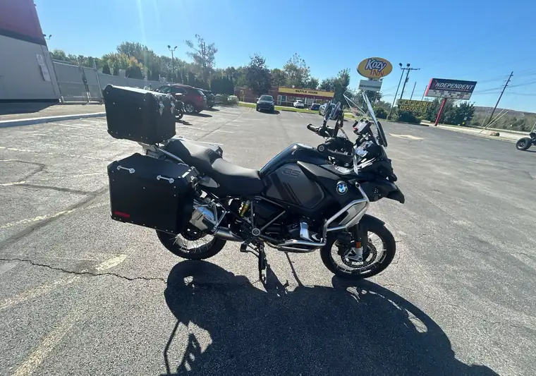 Black 2024 BMW R1250 GS Adventure motorcycle with luggage cases at pickup in Columbus, Ohio