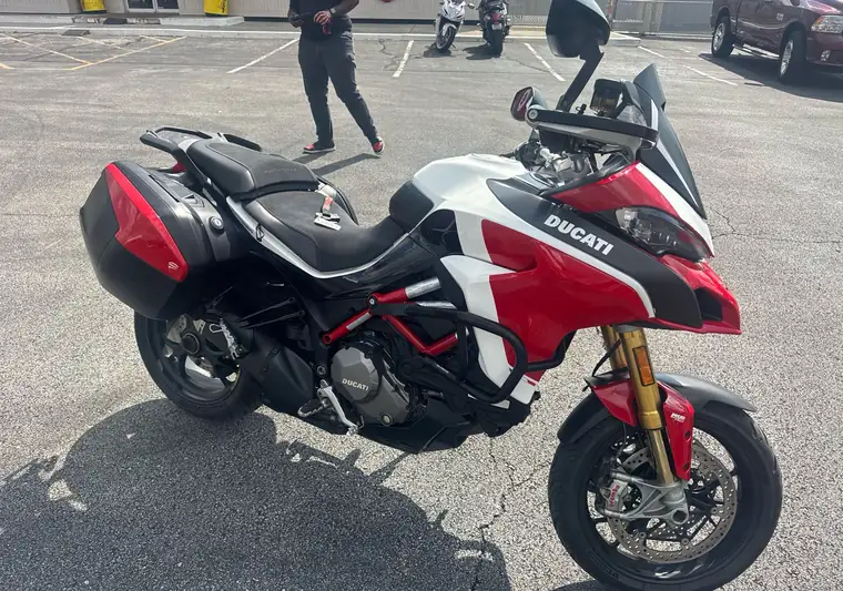 Red, white and black 2019 Ducati Multistrada 1260 motorcycle with side cases at pickup in Columbus, Ohio