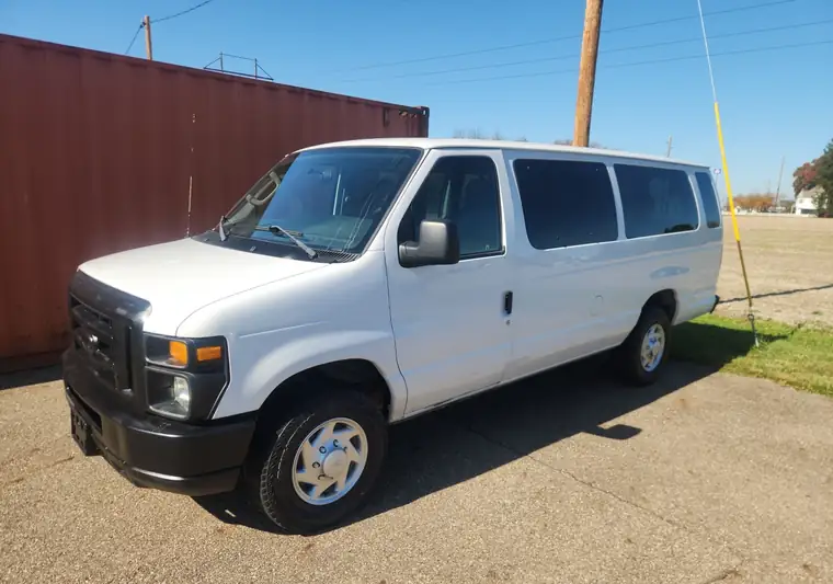 White 2014 Ford E-Series 15-passenger van at pickup in Navarre, Ohio
