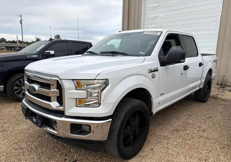 The same F-150 on a dirt lot at delivery in Clinton, Mississippi