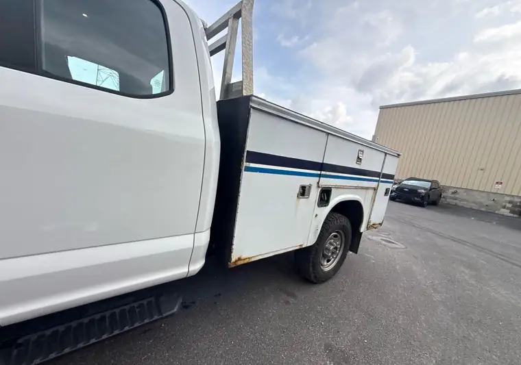 White 2020 Ford F-250 Super Duty with a utility service body at a Ford dealer in Orrville, Ohio