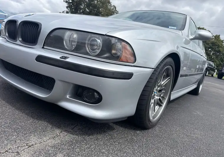 The same BMW M5 in a parking lot at delivery near Russell Springs, Kentucky