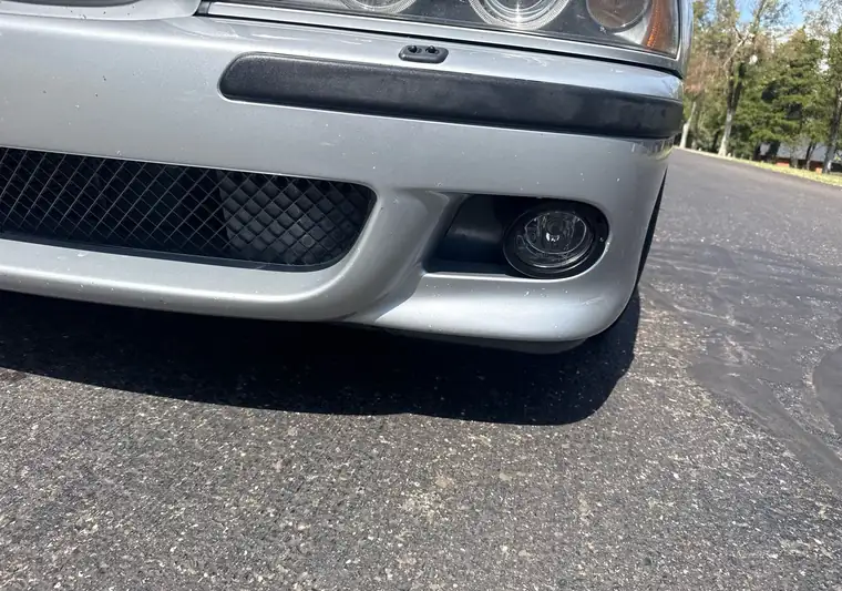 Silver 2002 BMW M5 front bumper at pickup in Oklahoma City