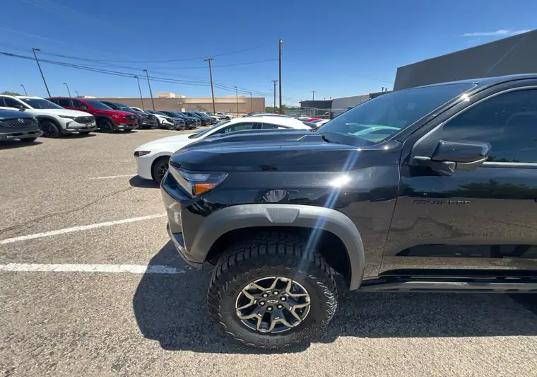 The same Chevrolet Colorado at a dealer lot at delivery in Santa Fe, New Mexico