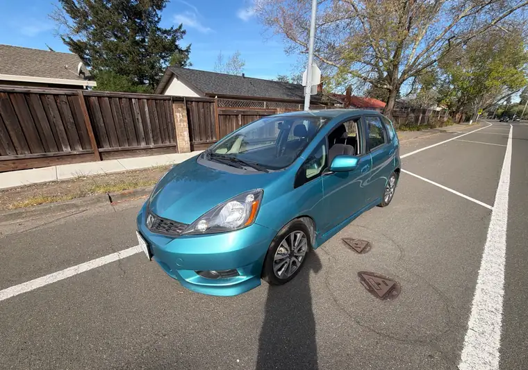 The same Honda Fit on a residential street at delivery in Santa Rosa, California
