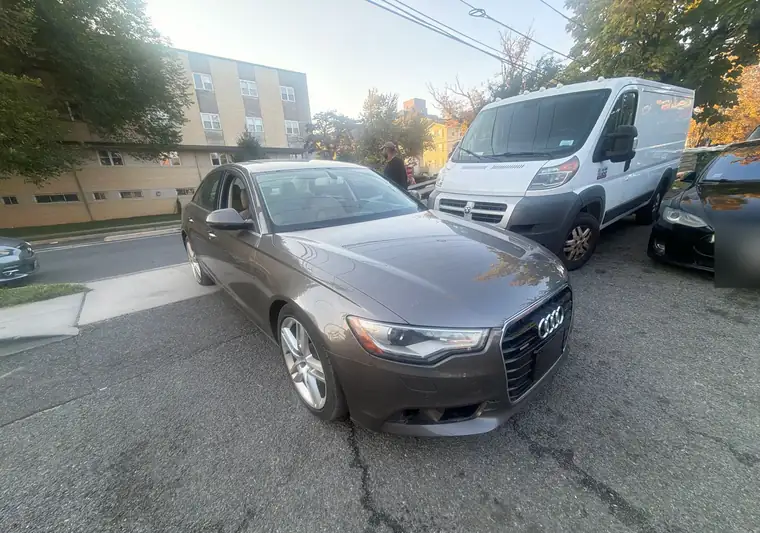 The same Audi A6 on a street at delivery in Washington, DC