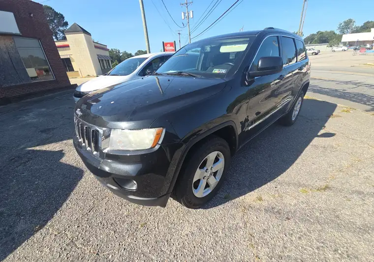 The same Jeep Grand Cherokee in a lot at delivery in Rocky Mount, North Carolina