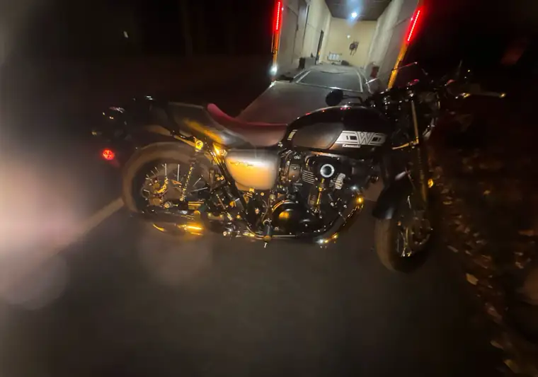 The same Kawasaki W800 Cafe motorcycle at night at delivery in Redding, Connecticut