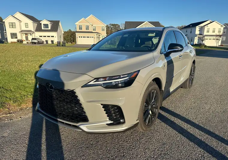 Gray 2026 Lexus 350h SUV parked on a residential street at pickup in Middletown, Rhode Island