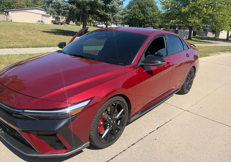 The same Elantra on a residential street at delivery in Sterling Heights, Michigan