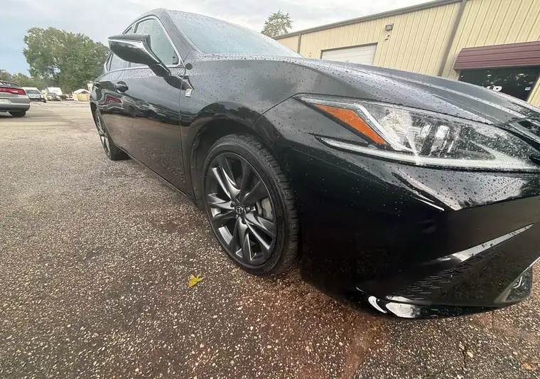 Black 2020 Lexus ES 350 sedan with water beads on the hood at pickup in Greenville, South Carolina