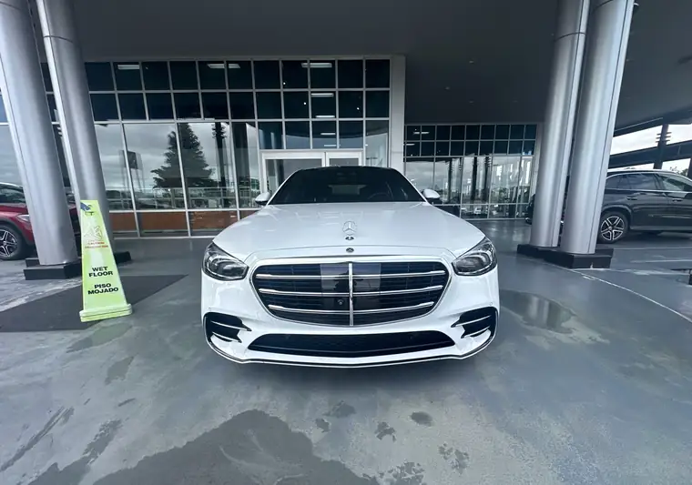 White 2026 Mercedes-Benz S-Class at a dealership entrance at pickup in Knoxville, Tennessee