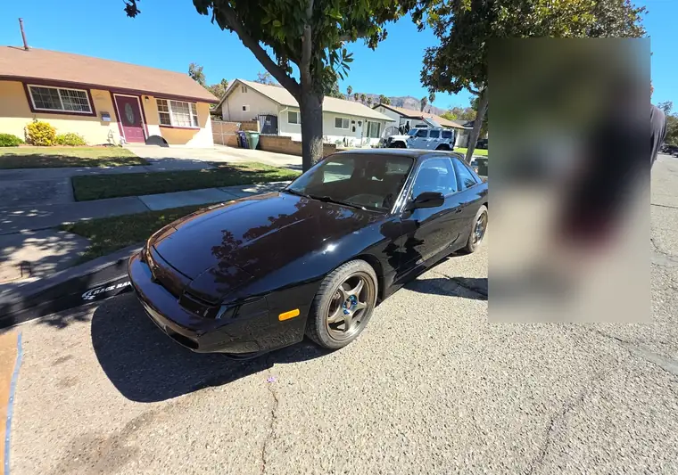 The same Nissan 240SX on a street at delivery in Fillmore, California