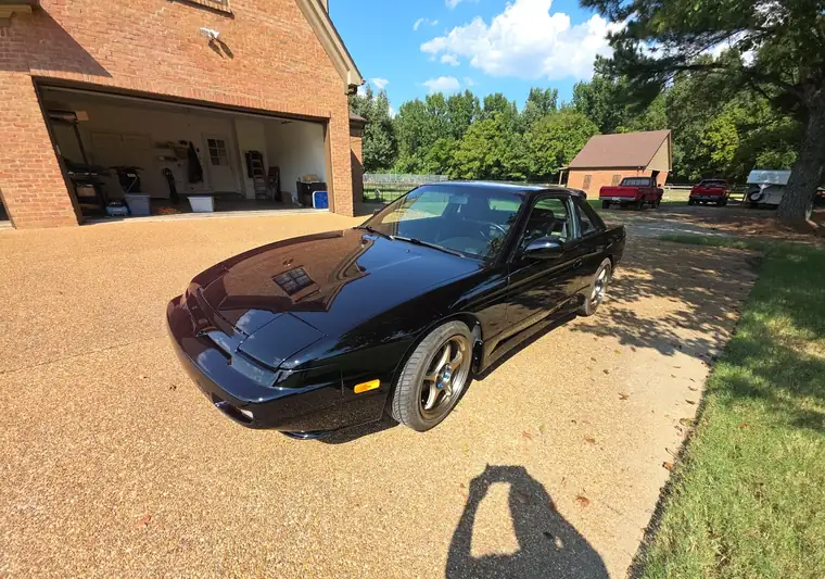 Black 1988 Nissan 240SX parked in a driveway at pickup in Collierville, Tennessee