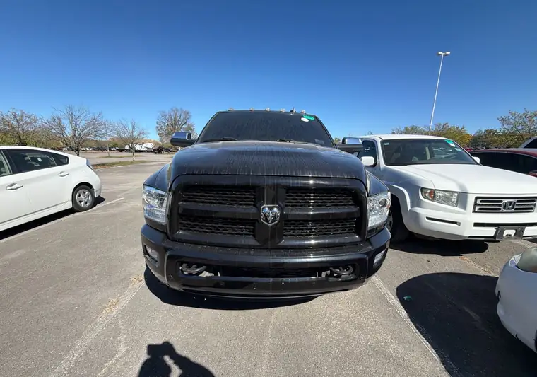 Black 2017 Ram 2500 pickup truck in a parking lot at pickup in the Nashville area